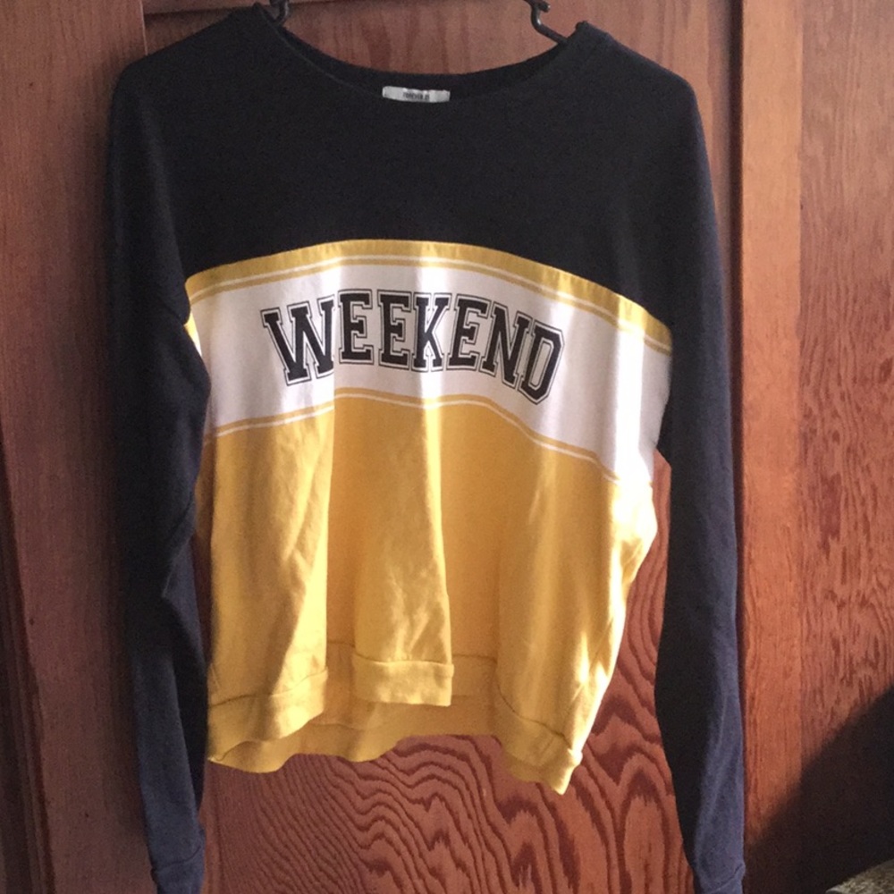 Yellow and black striped “Weekend” shirt.